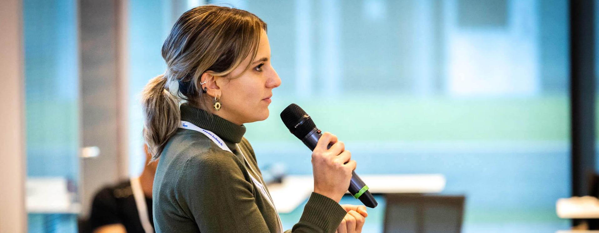 A woman with a microphone